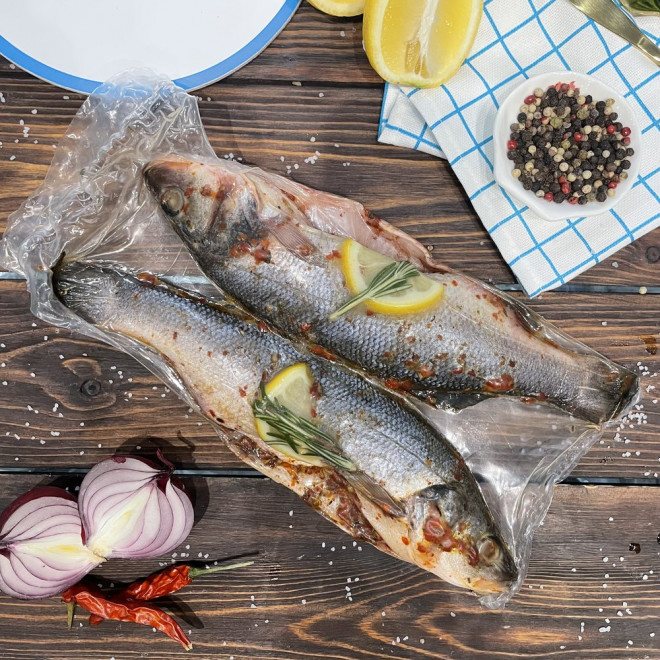 Сибас - очищенный, потрошеный в специях и оливковом масле